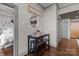Charming dining area with modern table and benches adjacent to the bedroom at 315 Arlington Ave # 705, Charlotte, NC 28203