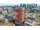 Exterior aerial shot of a pink glassed tower with surrounding city views at 315 Arlington Ave # 705, Charlotte, NC 28203