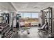 Spacious gym features modern equipment and panoramic windows offering expansive city views at 315 Arlington Ave # 705, Charlotte, NC 28203