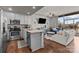 Cozy open living space, hardwood floors, island kitchen with stainless steel appliances at 315 Arlington Ave # 705, Charlotte, NC 28203