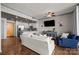 Open-concept living area with a modern kitchen and comfortable seating arrangement at 315 Arlington Ave # 705, Charlotte, NC 28203