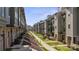 Exterior view of modern townhouses with well-manicured landscaping and inviting walkways at 324 Uptown West Dr, Charlotte, NC 28208