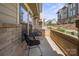 Cozy patio with brick accent, modern seating, and a view of the street, ideal for relaxing outdoors at 324 Uptown West Dr, Charlotte, NC 28208