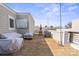 Rooftop deck with gray siding, brown pavers, and outdoor furniture ready for entertaining at 324 Uptown West Dr, Charlotte, NC 28208