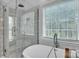 Luxury bathroom showcasing a freestanding tub and modern shower with frameless glass at 3565 Laboratory Rd, Lincolnton, NC 28092