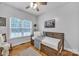 Cozy bedroom featuring hardwood floors, and a bright, inviting atmosphere at 3565 Laboratory Rd, Lincolnton, NC 28092