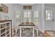 Cozy dining area with a small table, lots of natural light, unique tile flooring, and storage at 3565 Laboratory Rd, Lincolnton, NC 28092
