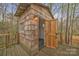 Interior and exterior view of a wooden tree house with an open door at 3565 Laboratory Rd, Lincolnton, NC 28092