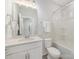 Well-lit bathroom featuring a tub with shower and a white vanity with quartz countertop at 4141 Polluck Way, Charlotte, NC 28209