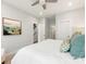 Comfortable bedroom featuring a ceiling fan and an ensuite bathroom with a sink and walk-in shower at 4141 Polluck Way, Charlotte, NC 28209