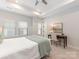 Bright bedroom features a desk and windows with a view, perfect for work or relaxation at 4141 Polluck Way, Charlotte, NC 28209