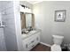 Bathroom with white vanity featuring double sinks, subway tile shower and modern fixtures at 436 Old Nc 90 Hwy, Taylorsville, NC 28681