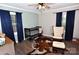 Bedroom featuring hardwood floors, bright windows, and calming paint at 436 Old Nc 90 Hwy, Taylorsville, NC 28681