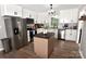 Modern kitchen featuring stainless steel appliances, white cabinets, and a butcher block island at 436 Old Nc 90 Hwy, Taylorsville, NC 28681