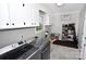 Spacious laundry room with modern washer and dryer, ample storage, and room for organization at 436 Old Nc 90 Hwy, Taylorsville, NC 28681
