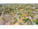 Overhead shot reveals home's location, surrounded by lush trees in a peaceful neighborhood, highlighting its desirable setting at 444 27Th Avenue Nw Cir, Hickory, NC 28601