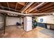 Unfinished basement offers potential for customization, featuring exposed ceiling and a utility sink area at 444 27Th Avenue Nw Cir, Hickory, NC 28601