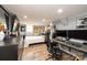 Well-lit bedroom with wood floors, complemented by a workspace for convenient living at 444 27Th Avenue Nw Cir, Hickory, NC 28601