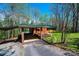 View of the brick carport and landscaping leading to the charming brick home at 444 27Th Avenue Nw Cir, Hickory, NC 28601