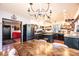 Spacious kitchen features an island, stainless steel appliances, and stylish light fixtures at 444 27Th Avenue Nw Cir, Hickory, NC 28601