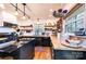 Charming kitchen features black cabinets, butcher block countertops, and stainless steel appliances at 444 27Th Avenue Nw Cir, Hickory, NC 28601