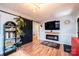 Stylish living room features hardwood floors, a cozy fireplace, and modern decor, creating an inviting atmosphere at 444 27Th Avenue Nw Cir, Hickory, NC 28601