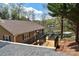 Inviting backyard featuring a multi-level deck with lake access and waterfront views at 458 Pinehaven Dr, Badin Lake, NC 28127