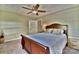 Comfortable bedroom features a wooden bed frame, and carpeted floors at 458 Pinehaven Dr, Badin Lake, NC 28127