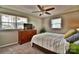Bedroom with natural light features carpeted floors and a ceiling fan at 458 Pinehaven Dr, Badin Lake, NC 28127