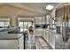 Bright, modern kitchen with stainless appliances, ample counter space, and open dining area at 458 Pinehaven Dr, Badin Lake, NC 28127