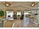 Spacious living area featuring hardwood floors, an open layout, and seamless transition to other rooms at 458 Pinehaven Dr, Badin Lake, NC 28127