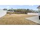 Large backyard enclosed by a white fence, offering a private outdoor space at 5104 Thomasville Dr, Belmont, NC 28012