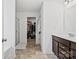 Bathroom featuring a vanity with dark cabinets, tile floor, and walk-in closet at 5104 Thomasville Dr, Belmont, NC 28012