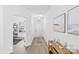 Bright and open hallway with hardwood floors, modern lighting, and stylish decor at 5104 Thomasville Dr, Belmont, NC 28012
