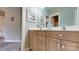 Well-lit bathroom with a stylish vanity and ample storage space at 6108 Mcilwaine Rd, Huntersville, NC 28078