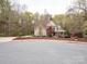 Charming two-story home with lush front lawn and inviting covered porch at 6108 Mcilwaine Rd, Huntersville, NC 28078