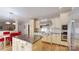 Well-equipped kitchen with island, stainless appliances, and custom cabinetry at 6108 Mcilwaine Rd, Huntersville, NC 28078