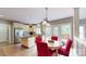 Bright kitchen with stainless steel appliances, granite countertops, and an island at 6108 Mcilwaine Rd, Huntersville, NC 28078