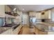 Spacious kitchen with stainless steel appliances, custom cabinets and granite countertops at 6108 Mcilwaine Rd, Huntersville, NC 28078