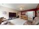 A recreational room with a wet bar and leather furniture, perfect for entertaining or relaxing at home at 6108 Mcilwaine Rd, Huntersville, NC 28078