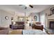 Spacious living room featuring hardwood floors and a cozy fireplace at 6108 Mcilwaine Rd, Huntersville, NC 28078