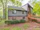 Attractive residence with a brick and panel exterior and a inviting wooden walkway to the entrance at 615 Ridgeway Dr, Belmont, NC 28012