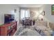 Inviting living room with neutral walls, a wooden bookshelf, area rug and comfortable seating at 615 Ridgeway Dr, Belmont, NC 28012