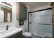 Bathroom with a walk-in shower and modern fixtures at 6307 Roanoke Dr # 17, Kannapolis, NC 28081