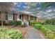 Inviting brick home with a landscaped walkway leading to the front entrance at 6307 Roanoke Dr # 17, Kannapolis, NC 28081