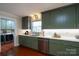 Galley kitchen with modern appliances and light countertops at 6307 Roanoke Dr # 17, Kannapolis, NC 28081