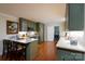 Bright eat-in kitchen with stainless steel appliances and a connected laundry room at 6307 Roanoke Dr # 17, Kannapolis, NC 28081