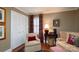 Comfortable living room with patterned furniture, wood floors, and bright windows at 6307 Roanoke Dr # 17, Kannapolis, NC 28081