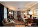 Cozy living room with elegant decor, hardwood floors, and comfortable seating at 6307 Roanoke Dr # 17, Kannapolis, NC 28081