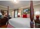 Well-lit primary bedroom with a four-poster bed and traditional decor at 6307 Roanoke Dr # 17, Kannapolis, NC 28081